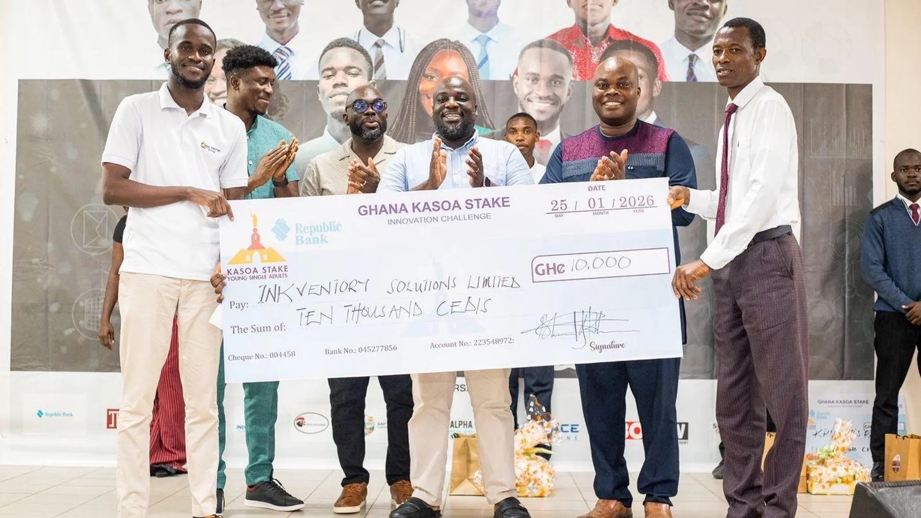 People on stage at the Ghana Kasoa Stake Innovation Challenge, holding a GHS 10,000 cheque made out to Inkventory Solutions Limited